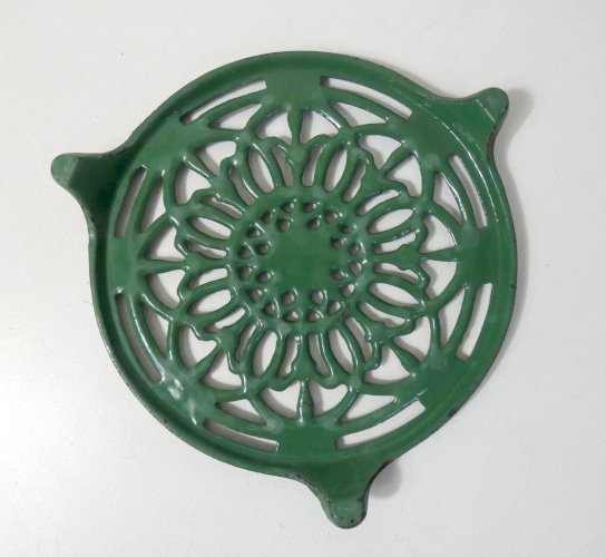 dessous de plat vert en fonte vintage