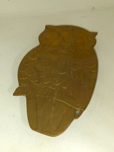 vintage brass owl-shaped trivet in good condition