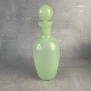 Elegant bottle made of green opaline glass