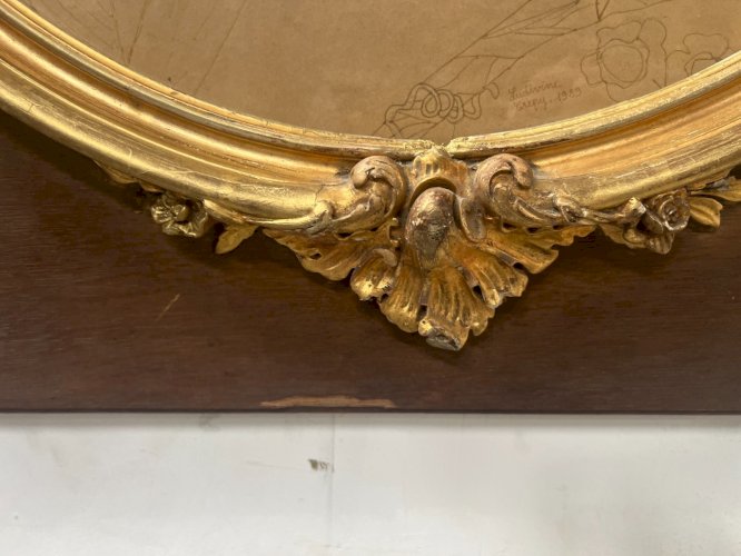 Encadrement ovale en bois et stuc doré XX siècle