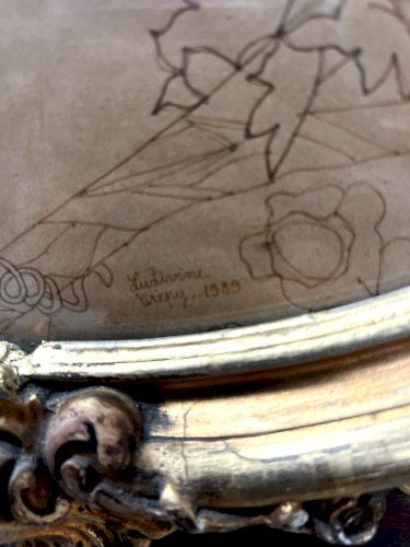 Encadrement ovale en bois et stuc doré XX siècle