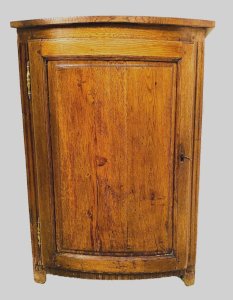 Half-moon corner cabinet in solid oak, 19th century.