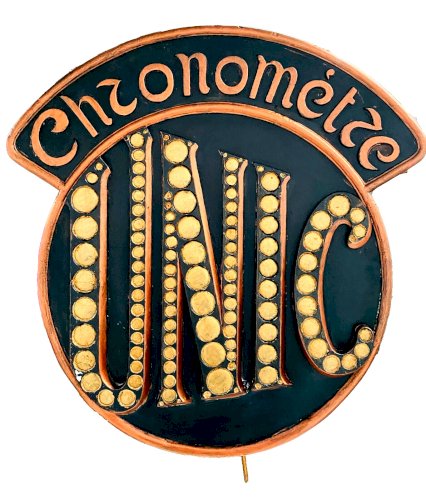 Enseigne publicitaire "Chronomètre UNIC " en stuc patiné XX siècle