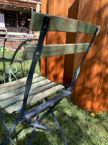 Ensemble bistrot ancien fer forgé – table années 30 et chaises pliantes