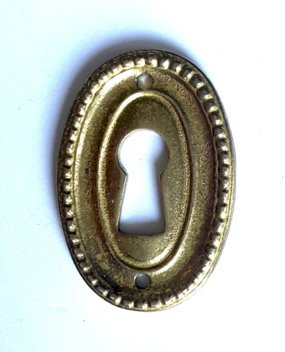 entree de serrure ancienne ovale bronze laiton massif style louis XVI 37x25 mm