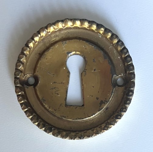 entree de serrure ancienne ronde en bronze laiton massif style louis XVI