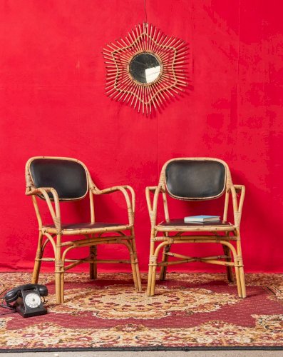Ernest, la paire de fauteuils en osier et cuir N°711