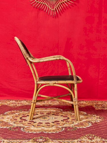 Ernest, la paire de fauteuils en osier et cuir N°711