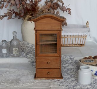 Vintage wooden shelf with drawers and mesh door