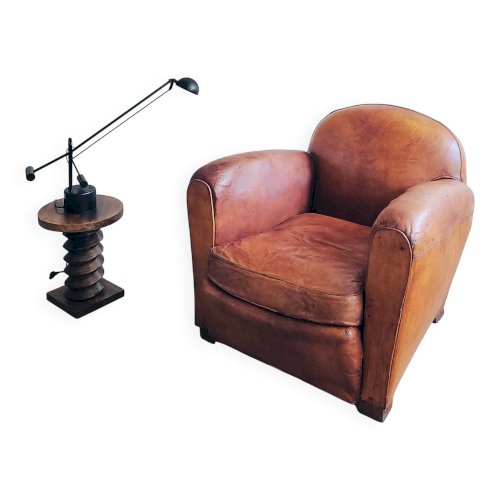 Fauteuil club en cuir patiné