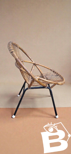 Fauteuil coquille en rotin