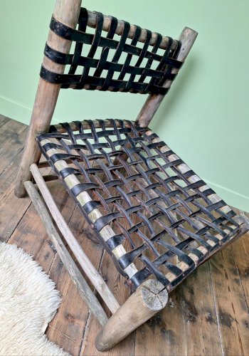 Fauteuil vintage cuir tressé et bois, meuble siège ancien