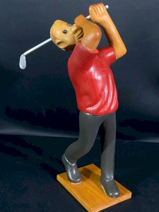Polychrome wooden figurine of a golfer marked Romer