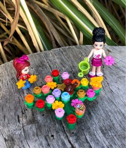Lego Friends figurines in the garden