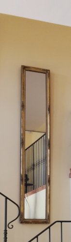 Glace ancienne dentre-deux en bois doré XVIIIe