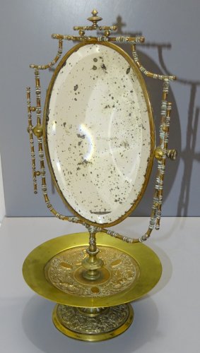 -GLACE MIROIR NIII A POSER VIDE POCHE SUR PIED BRONZE à décor de PUTTIS XIXe  D
