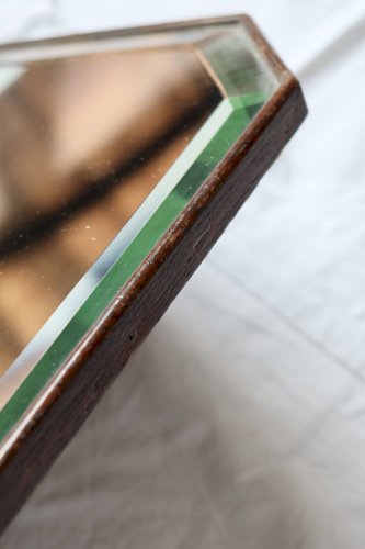 Grand miroir ancien biseauté – bois foncé et nœud décoratif en métal bronzé