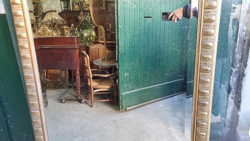 GRAND MIROIR BISEAUTE DORE AVEC TETE REF JE