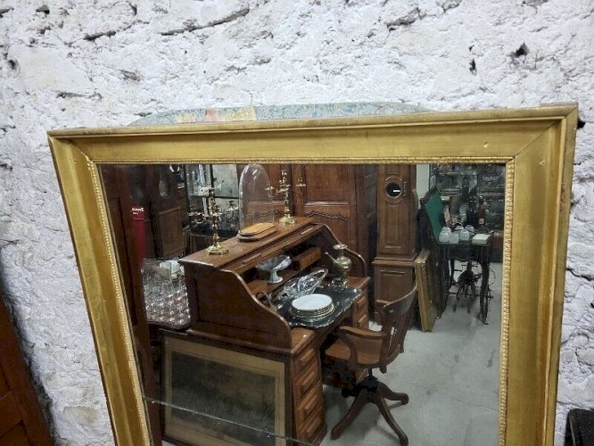 GRAND MIROIR DORE EN 2 PARTIES DU DEBUT DU XIX ème SIECLE