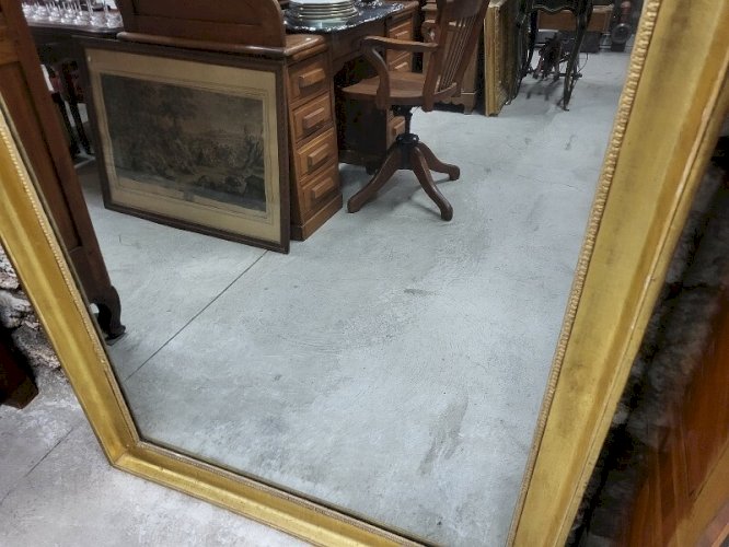 GRAND MIROIR DORE EN 2 PARTIES DU DEBUT DU XIX ème SIECLE