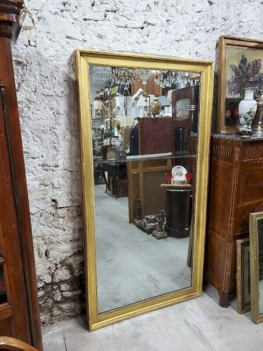 GRAND MIROIR DORE EN 2 PARTIES DU DEBUT DU XIX ème SIECLE