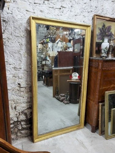 GRAND MIROIR DORE EN 2 PARTIES DU DEBUT DU XIX ème SIECLE