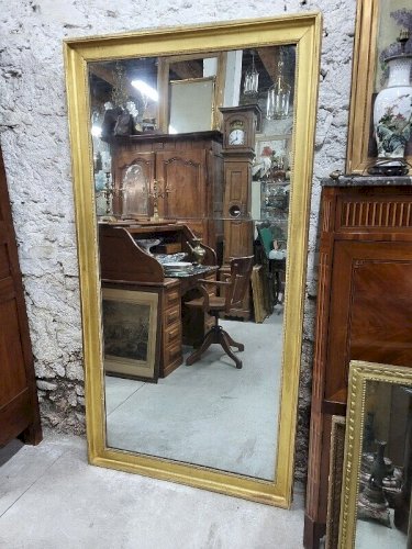 GRAND MIROIR DORE EN 2 PARTIES DU DEBUT DU XIX ème SIECLE