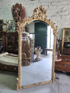 GRAND MIROIR DORE LOUIS XV A COQUILLE DU XIX ème SIECLE