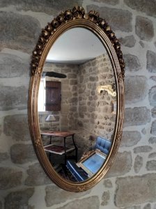 Grand miroir ovale ancien, doré
