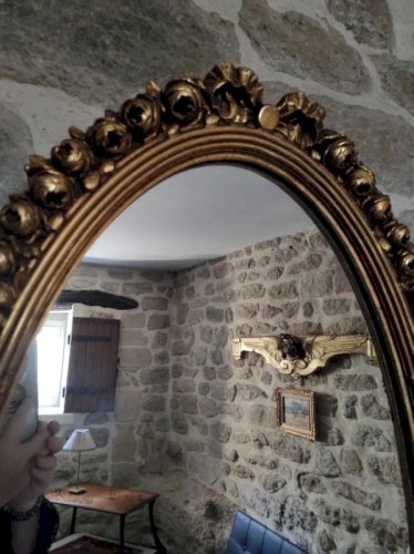 Grand miroir ovale ancien, doré
