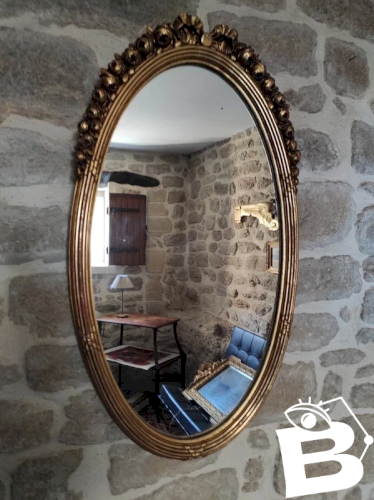 Grand miroir ovale ancien, doré