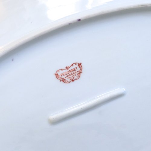 Grand plat ovale à lor fin en porcelaine de Limoges Peconnet