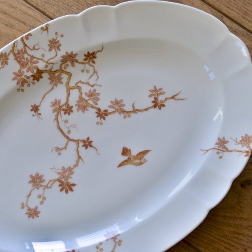 Grand plat ovale ancien en porcelaine de Limoges Haviland, décor oiseaux
