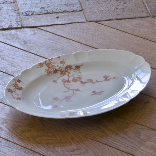Grand plat ovale ancien en porcelaine de Limoges Haviland, décor oiseaux
