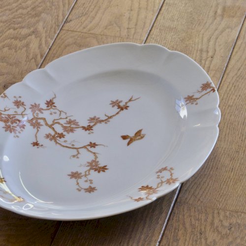 Grand plat ovale ancien en porcelaine de Limoges Haviland, décor oiseaux