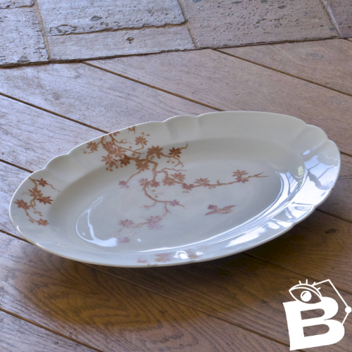 Grand plat ovale ancien en porcelaine de Limoges Haviland, décor oiseaux