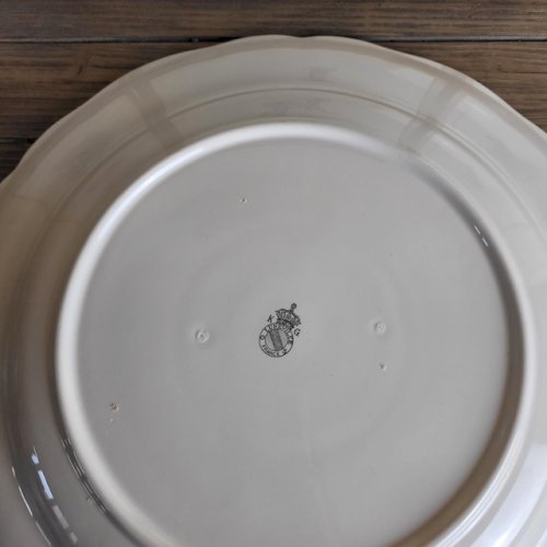 Grand plat rond KG Lunéville Réverbère, faïence de lest, décor floral