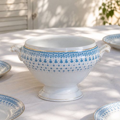 Grand saladier de 1909 en porcelaine Oscar Shaller bleu et or