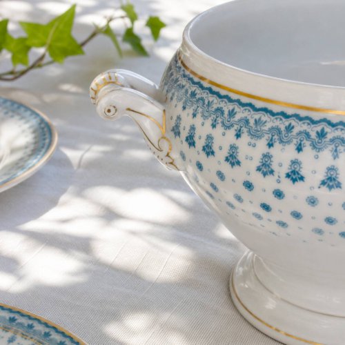 Grand saladier de 1909 en porcelaine Oscar Shaller bleu et or
