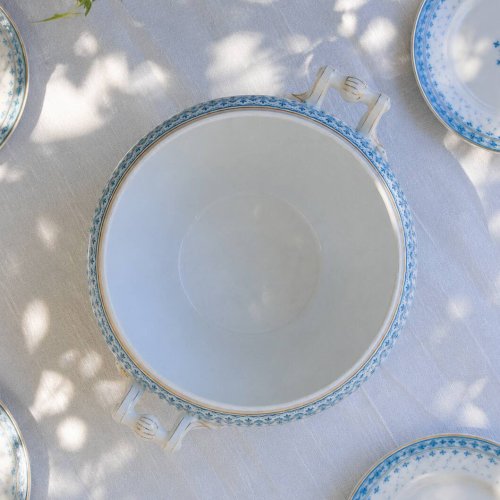 Grand saladier de 1909 en porcelaine Oscar Shaller bleu et or