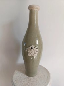 grand vase vert deau craquelé avec fleur en bon etat