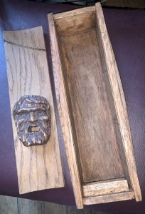 Large sculptor or painter's box in oak with carved Bacchus head