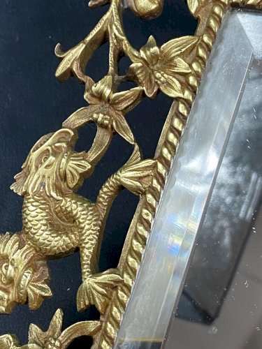Grande paire d'appliques murales à fond de miroir en bronze de style Renaissance