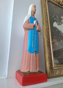 Large ancient statue of the Virgin, vintage religious decoration