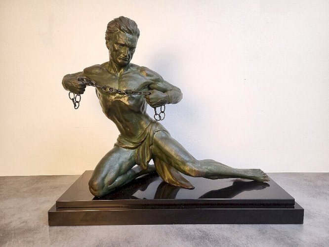GRANDE STATUE EN REGULE ET MARBRE HOMME ENCHAINE DE J RONCOURT