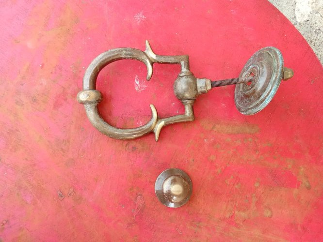 heurtoir de porte en bronze avec son clou 