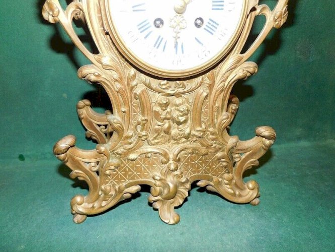 HORLOGE PENDULE EN BRONZE DECOR ANGELOT DU XIX ème SIECLE N17