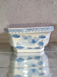 Asian bonsai planter with floral decor in good condition.