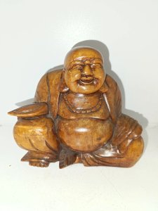 joli bouddha en bois sculpte en bon etat