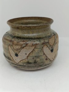 pretty stoneware pot with a signature to be identified in the style of the bollard in bollard